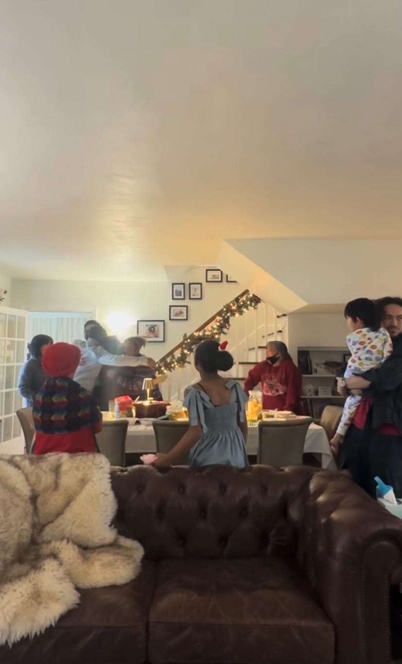 Robyn Brown and Alejandro Castillo's family hugging